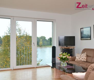 Traumhafter Blick - moderne Wohnung in direkter Rheinlage - Photo 2