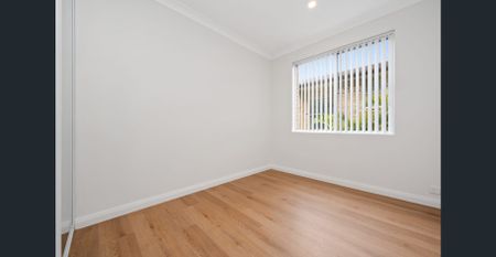 Modern Comfort Meets Convenience – Renovated 2-Bed Apartment Close to Everything - Photo 3