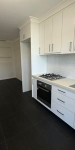 RENOVATED 1 BEDROOM IN QUIET COMPLEX - Photo 4