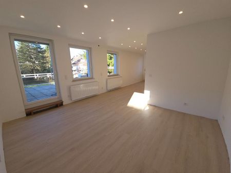 Erstbezug: 3-Zimmer Wohnung mit großzügiger Dachterasse im 1. OG - Photo 2