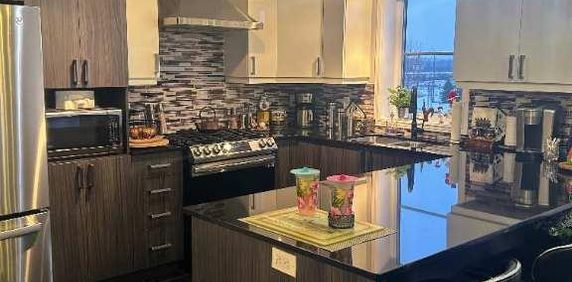 Emplacement de choix (A25 & 440) et tranquilité - 200 boulevard des Cépages, unité 401 (dernier étage et unité de coin) (disponible 1er juin 2026) - Photo 2