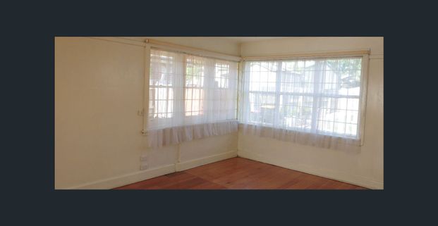 Charming, Light-Filled Home with Versatile Living Spaces - Photo 1