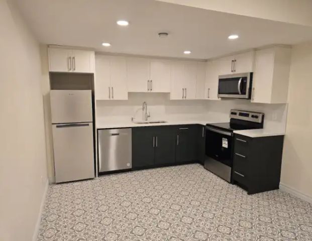 RENT a bright and modern 2-bedroom, 1bath legal basement suite. | Calgary - Photo 1