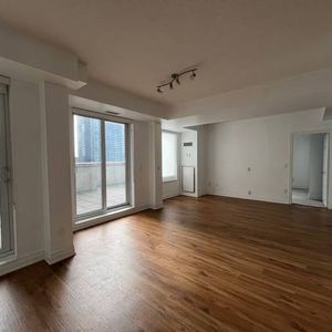 BLOOR & YONGE: LARGE 2 BEDROOM CONDO W/ PARKING & LOCKER INCLUDED - Photo 2