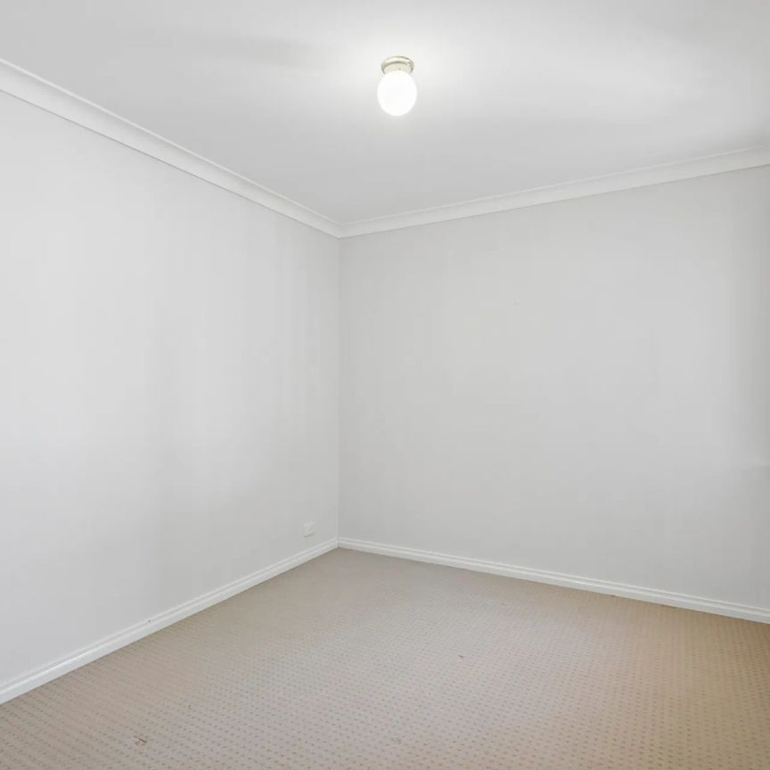 Immaculate Street Front Home with Two Living Areas - Photo 1