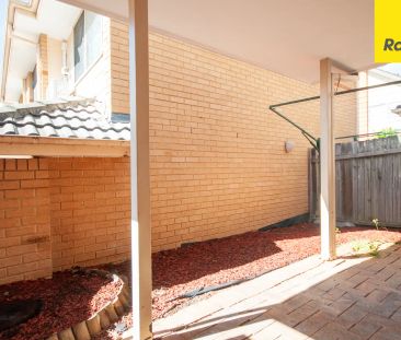 UPDATED STREET-FACING TOWNHOUSE WITH SPACE, STYLE & CONVENIENCE - Photo 4