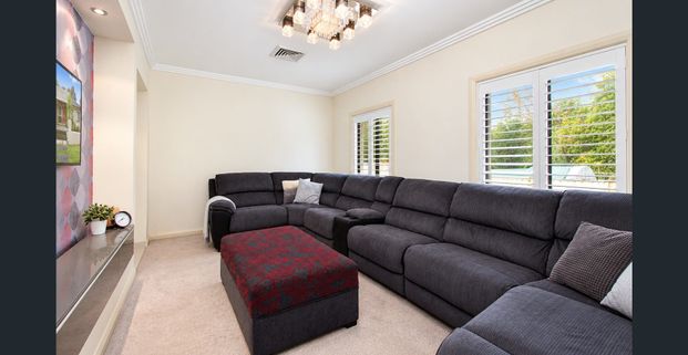 Spacious Family Home with Multiple Living Areas - Photo 1