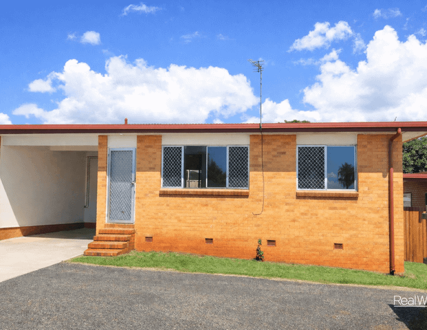 Convenient City Location with Spacious Fenced Yard - Photo 1