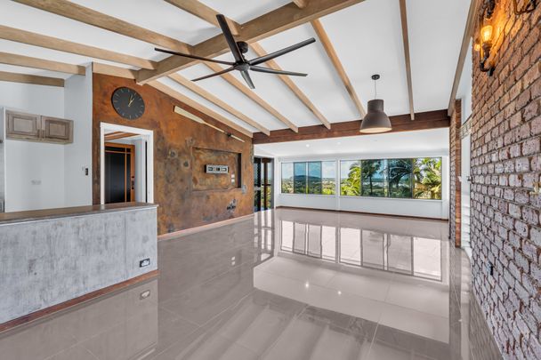 TWO-LEVEL HOME WITH PANORAMIC OCEAN VIEWS - Photo 1