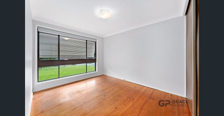 Charming 4-Bedroom Family Home in Prime Location - Photo 4