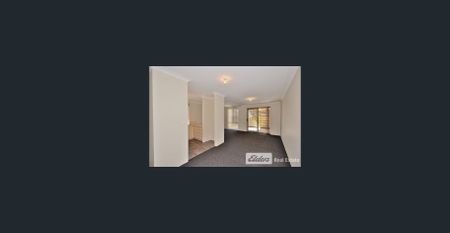 Charming Unit with Courtyard and Carport - Photo 2