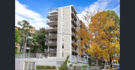 SUN-FILLED APARTMENT WITH LEAFY OUTLOOK - Photo 2