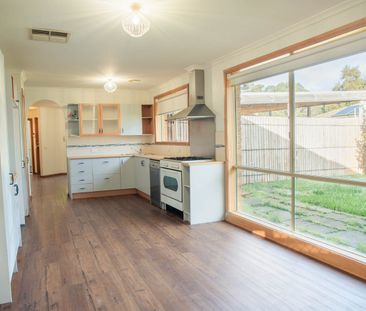 Comfortable Family Home with Solar, Cooling & Easy Maintenance Yard - Photo 3