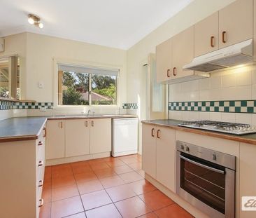 Charming 3-Bedroom Home with Lush Gardens - Photo 2