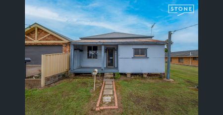 Two bedroom home with lawn maintenance included - Photo 3