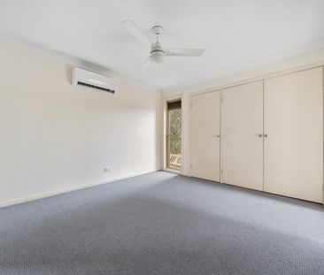 Charming Family Home in a Peaceful Suburban Setting - Photo 1