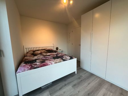 Gelijkvloers appartement met 2 slaapkamers en tuin - Foto 5