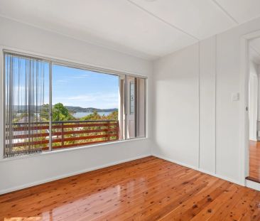 Conveniently Located Cottage with Captivating Water Views - Photo 6