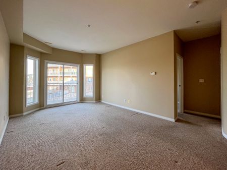 Spacious 1 Bed + Den In Clareview | Ac & Underground Parking | Heat & Water Included - Photo 3