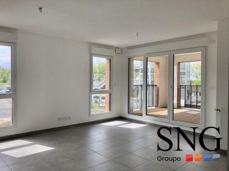 T3 AVEC LOGGIA ET DEUX PARKINGS - Photo 3