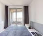 Byt v minimalistickom štýle s výhľadom na hrad - Fotografia 5