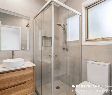 Spacious Family Living with Versatile Two-Level Design - Photo 6