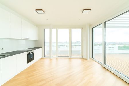 Lichtdurchflutete Dachgeschosswohnung mit beeindruckendem Panoramablick auf die Donauinsel - Photo 4