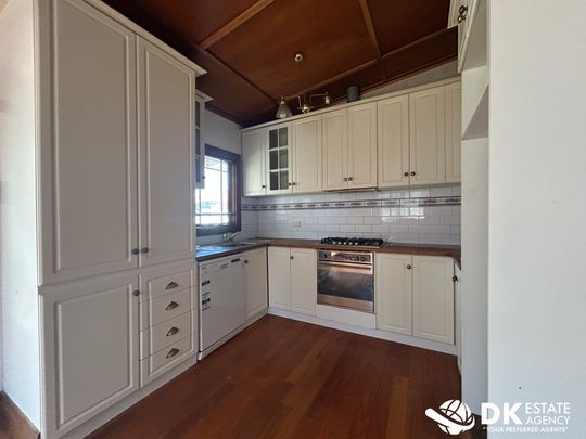 Comfortable & Convenient Living in the Heart of Sunshine - Photo 1