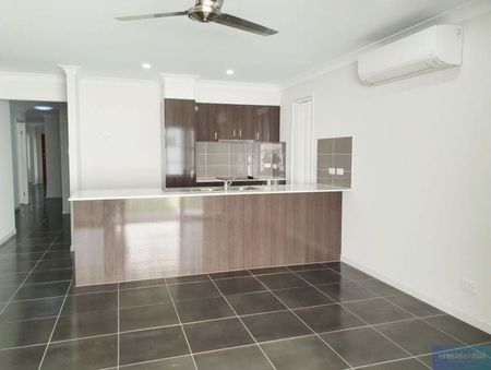 Spacious and modern rental property offers comfortable living in the sought-after Holmview area - Photo 4