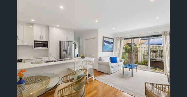 Fully furnished home where city convenience meets coast access - Photo 1