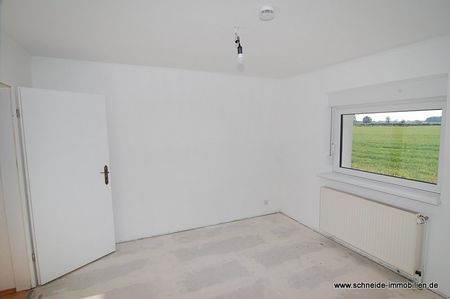 Freundliche 2-2/2-Zimmer-Erdgeschoss-Wohnung mit Terrasse im Gartenanteil - Foto 2