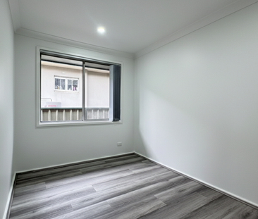 FRESHLY RENOVATED HOME OPPOSITE PARK | GARAGE & WORKSHOP! - Photo 6