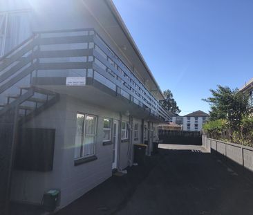 Tidy and spacious, this one-bedroom upstairs flat sits in a quiet b... - Photo 3