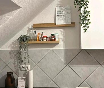 Gemütliche helle Dachgeschosswohnung in Uni-Nähe - Foto 1