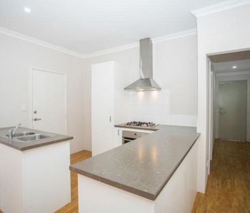 Coastal Comfort: Your Family Home Steps Away from the Beach! - Photo 3