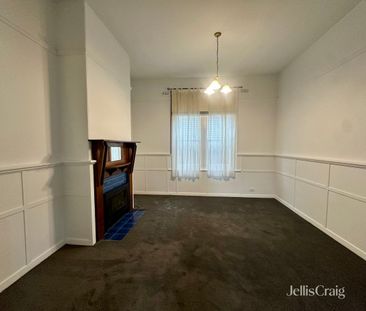 Charming Four Bedroom Home in Prime Location - Photo 1