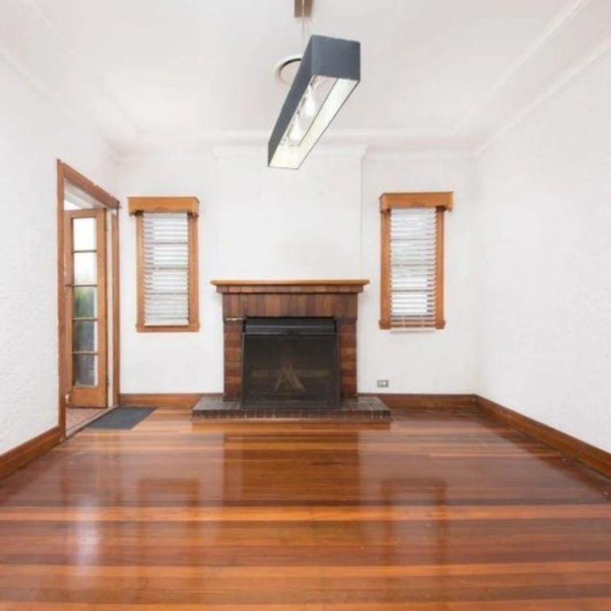 Elegant Stucco Double Brick Home with Character and Modern Comfort - Photo 1