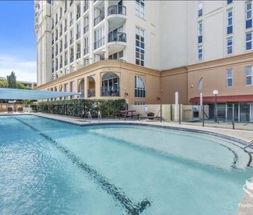 Light-Filled Luxury in Emerald Lakes Most Sought-After Building - Photo 1