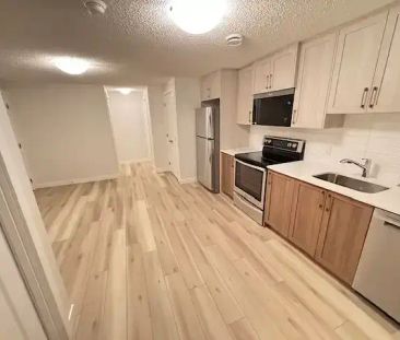 Brand New 2 Bedrooms, 1 Full Bath legal Basement Suite, Available f... - Photo 1