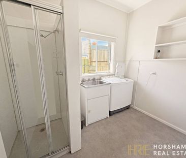 Modern Three-Bedroom Home Close to the CBD - Photo 1