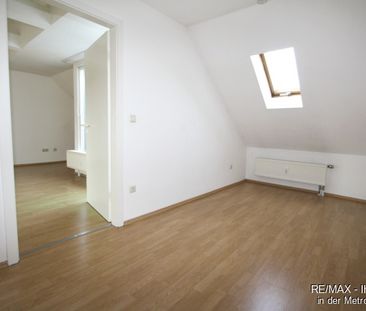 Gemütliche Dachgeschosswohnung mit Loggia und Einbauküche - Foto 1