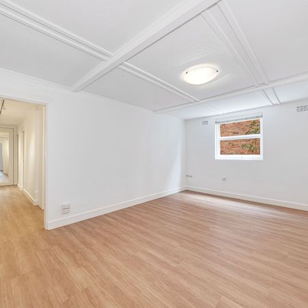 Renovated Two Bedroom Duplex in Convenient Location - Photo 3