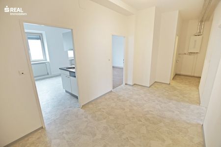 Renovierte 3 Zimmer Mietwohnung mit Balkon in saniertem Wohnhaus im Stadtzentrum! - Photo 4