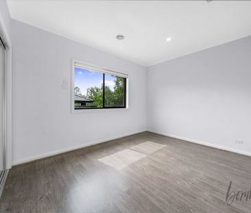 Modern, Low-Maintenance Living in a Secure & Stylish Home - Photo 1