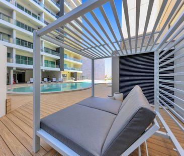 STUNNING FULLY FURNISHED STUDIO APARTMENT - Photo 1