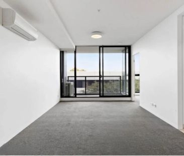 Bright two bedroom with storage cage. - Photo 1