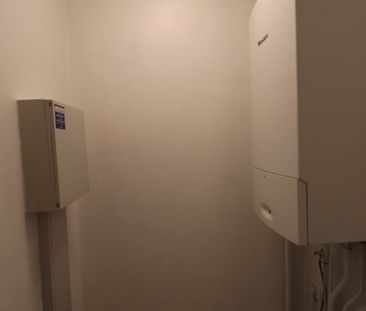 Een gerenoveerd appartement op de benedenverdieping rechts van de r... - Foto 3