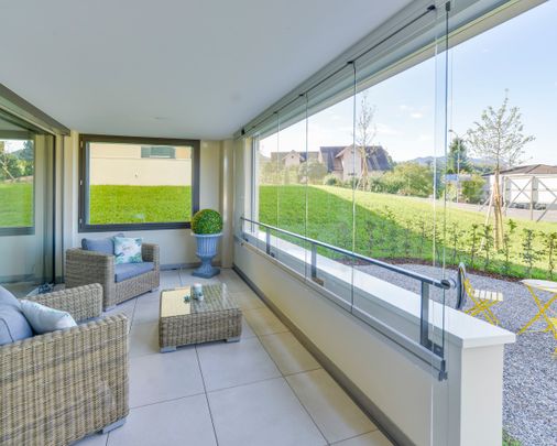 Wohnung mit sonniger Loggia und Gartensitzplatz - Photo 1