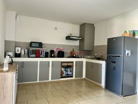 Location Appartement 3 pièces 65m² ST JOSEPH 97480 - Photo 4