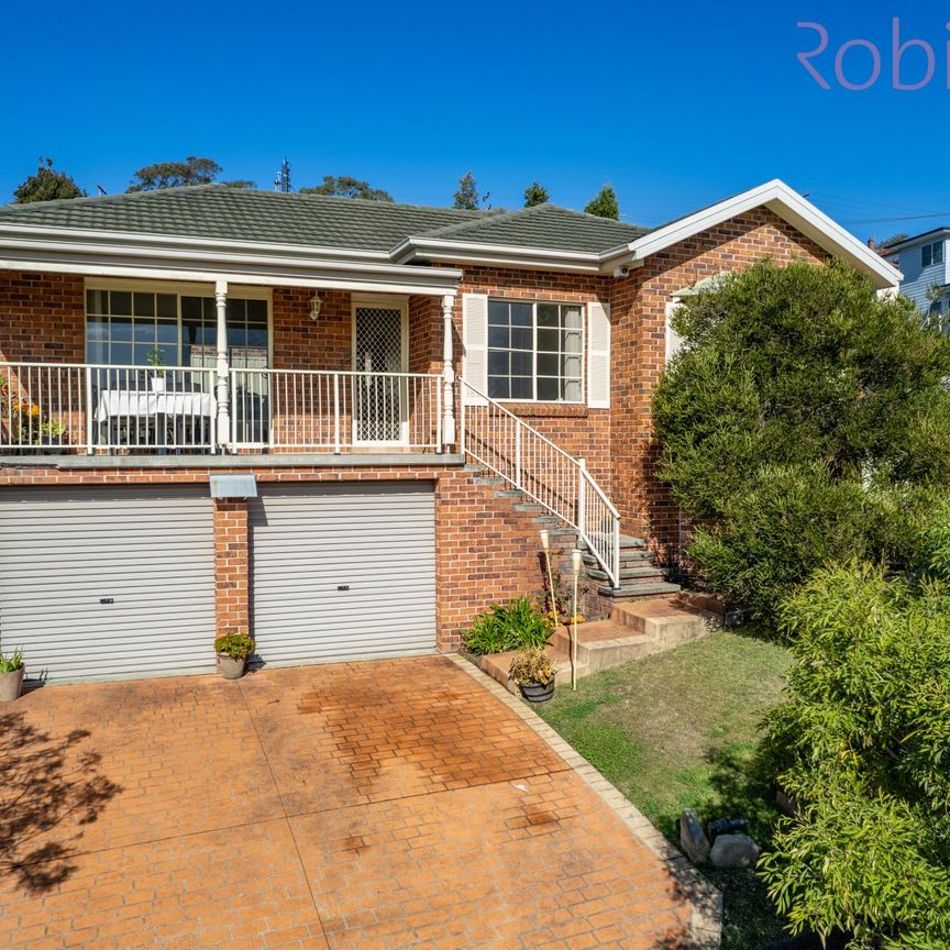 Elevated three bedroom modern home with double garage - Photo 1